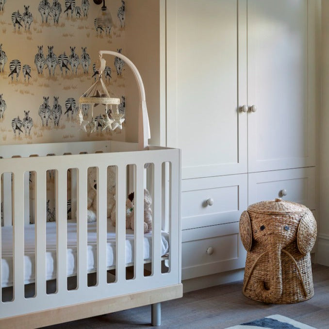 Nursey by Cave Interiors featuring Juliet Travers' Dazzle zebra wallpaper