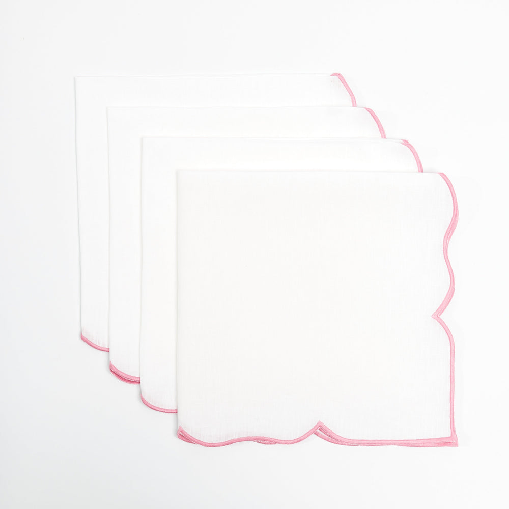 Pink Ava linen napkin showing pink embroidered edge detail