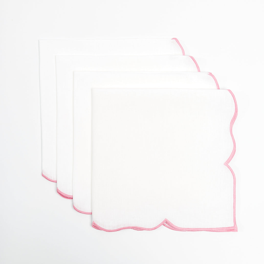 Pink Ava linen napkin showing pink embroidered edge detail