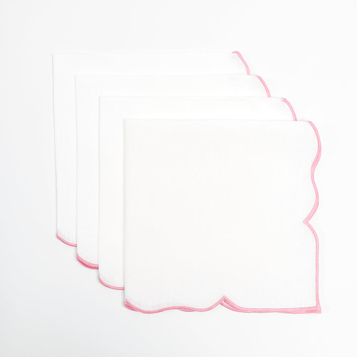 Pink Ava linen napkin showing pink embroidered edge detail