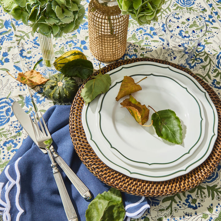 Blue Sasha napkin folded on a place setting