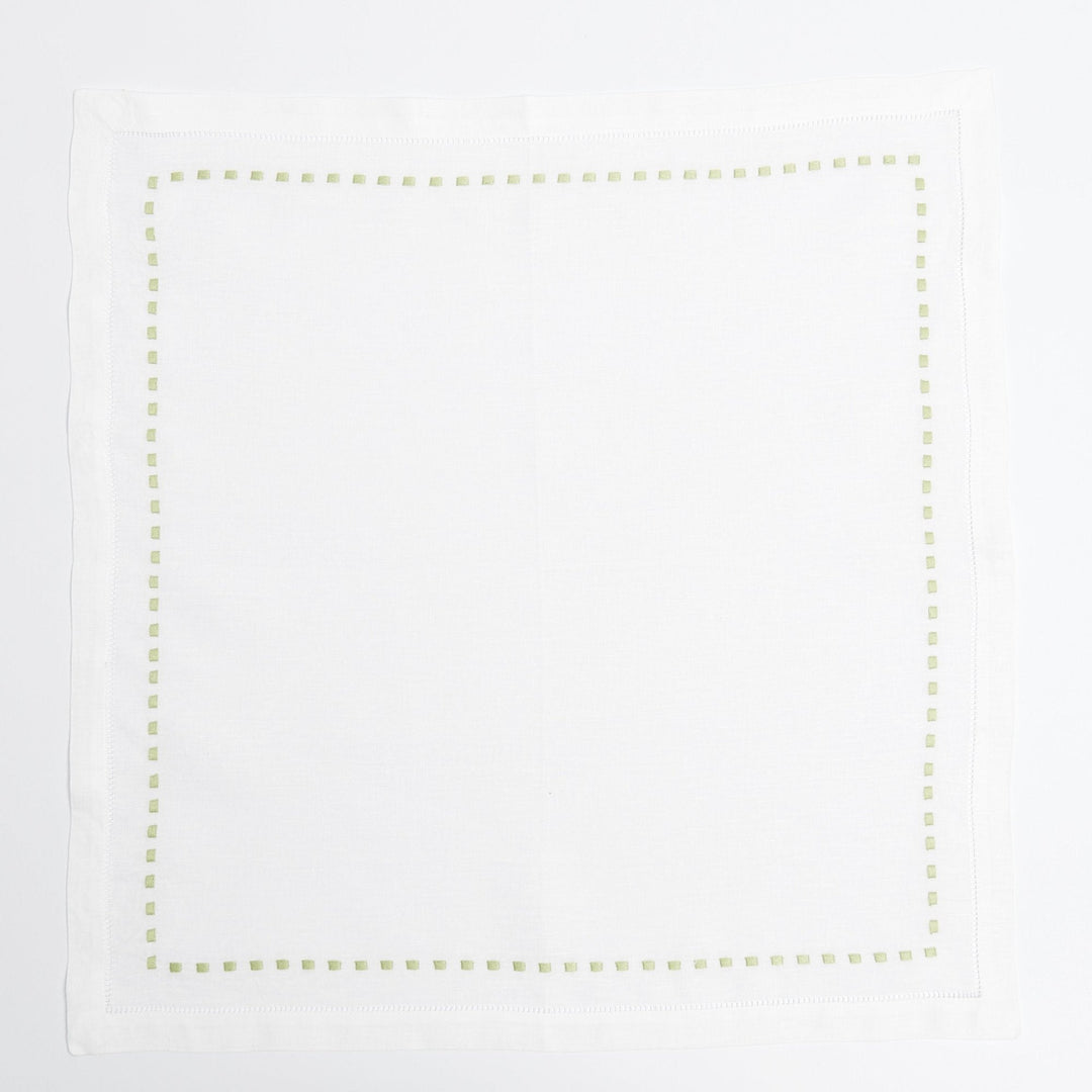 Green Dash napkins styled on a laid table