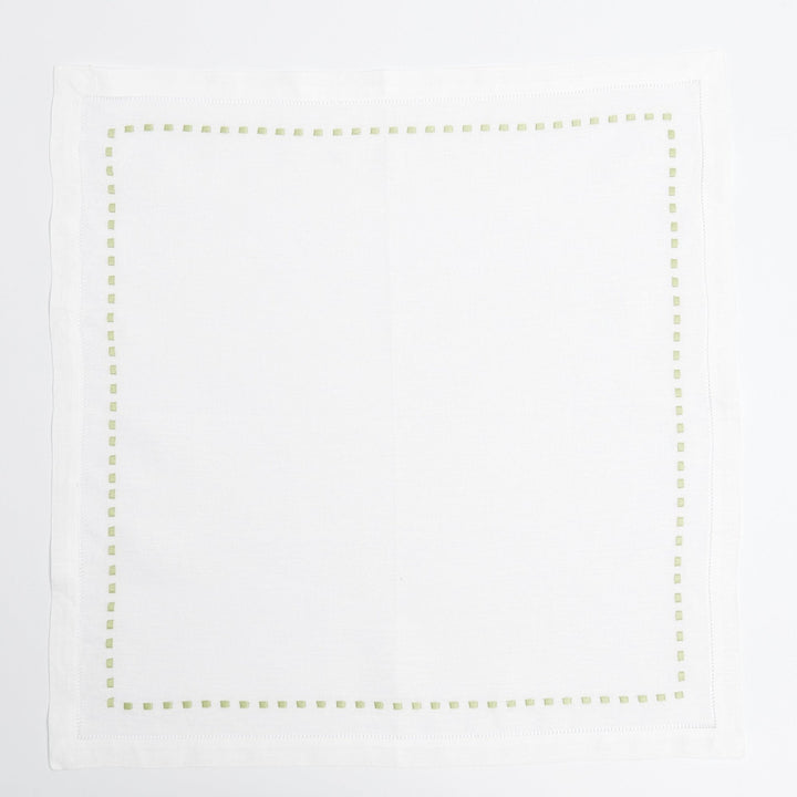 Green Dash napkins styled on a laid table