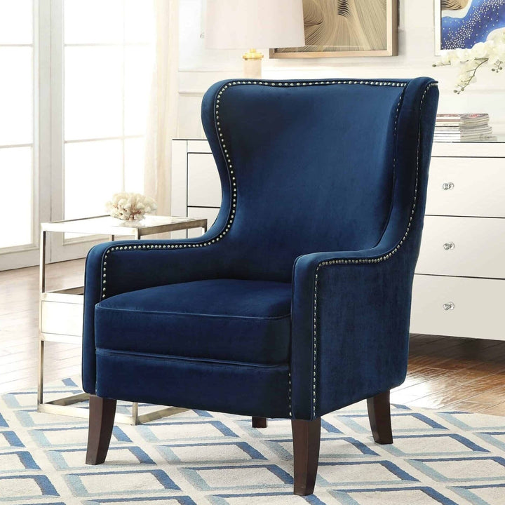 Orson Sapphire Blue Velvet Wingback Armchair with Chrome Studs