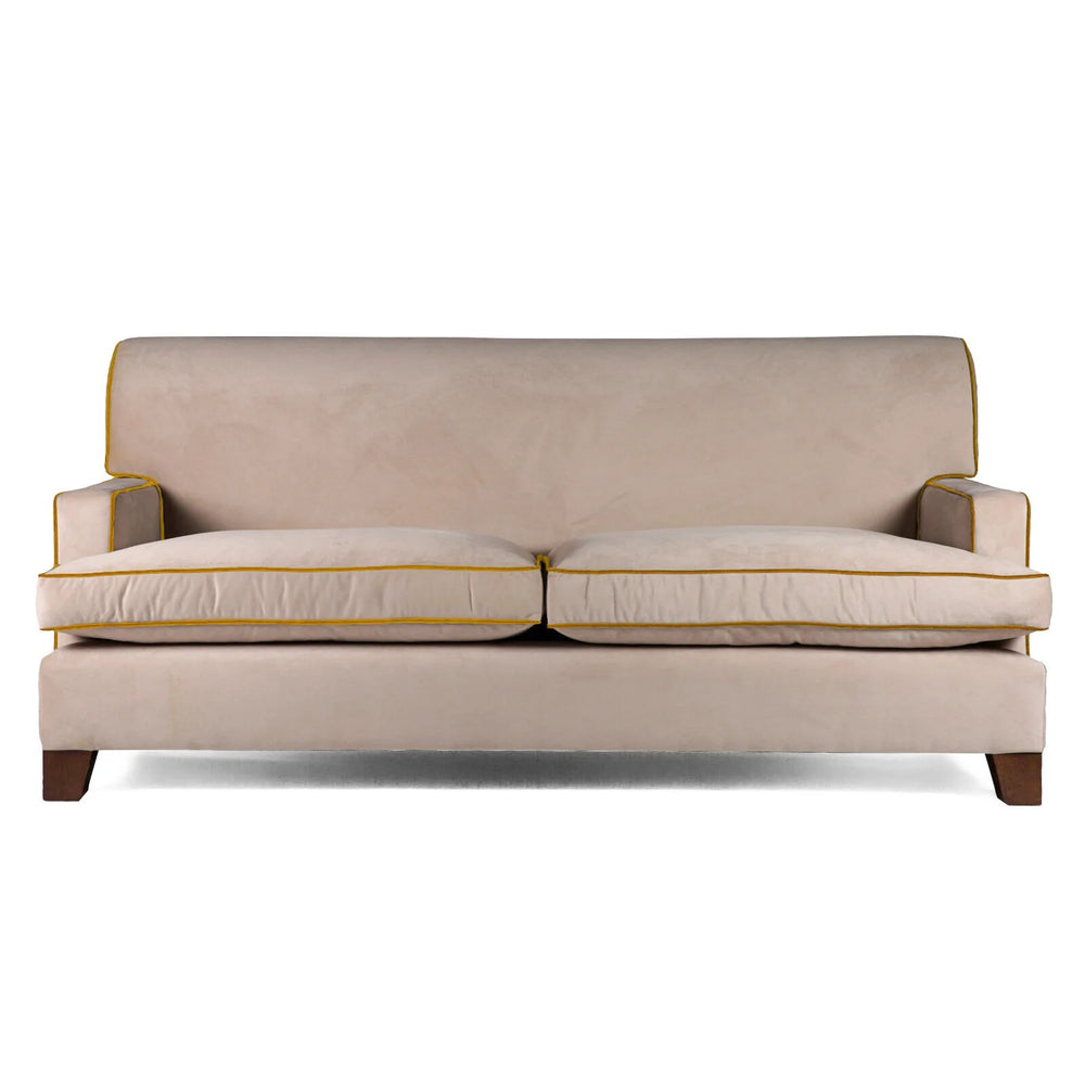 The Kelling Sofa in Putty Velvet with Marmalade Yellow Piping | Decoralist